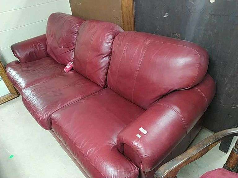 Lazboy red leather sofa, discoloration and wear Dixon's Auction at