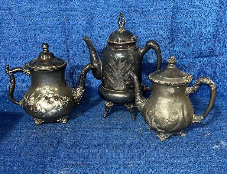 Metal teapots Auction Services LTD