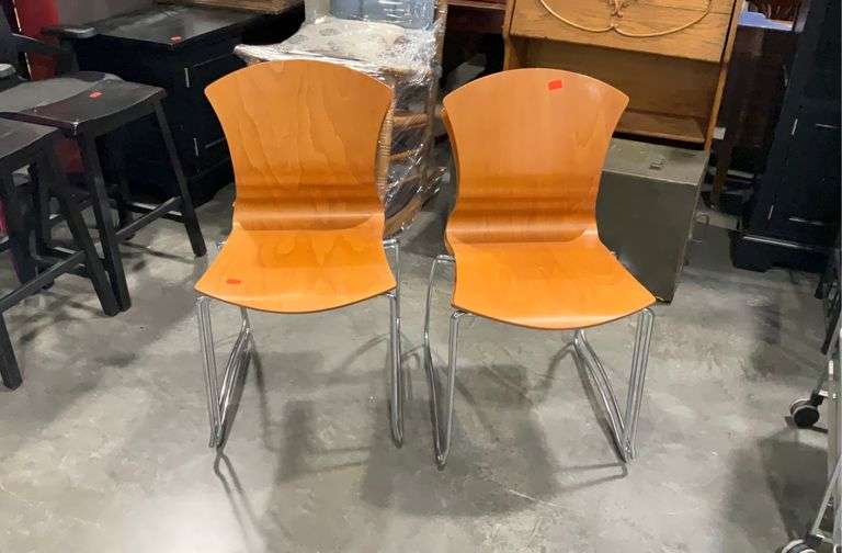 Four cantilevered bentwood chairs, stackable, minor dings as shown