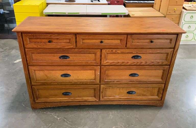 Thornwood natural wood 9 drawer dresser 69x22x41” Hash Auctions