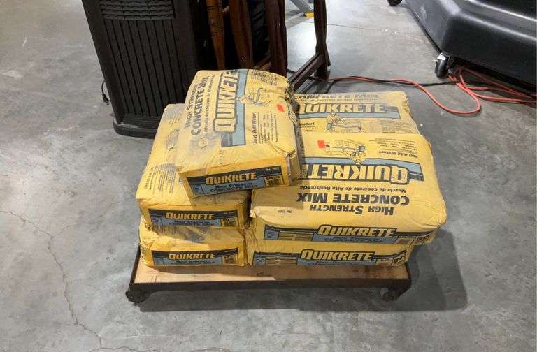 Seven 80 pound bags of Quikrete concrete, cart not included Hash Auctions