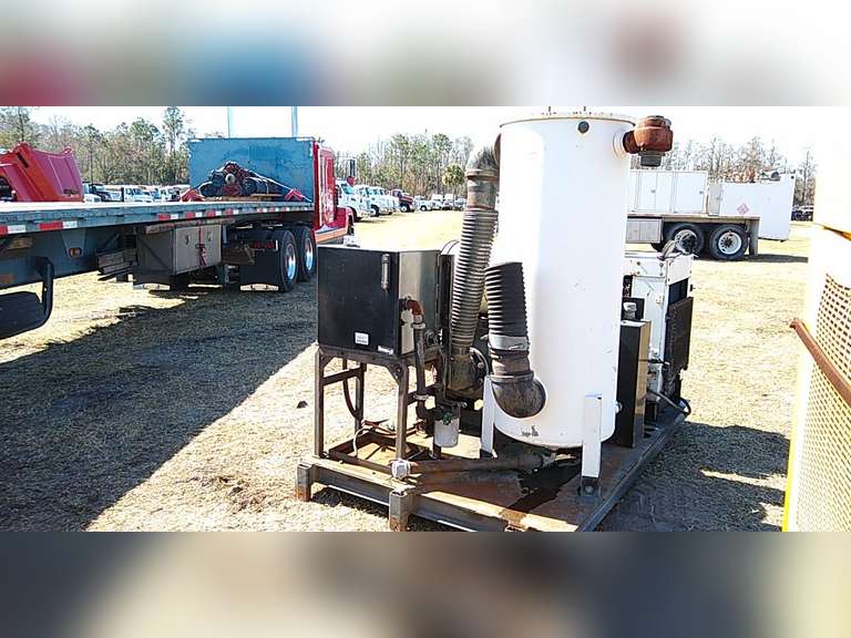 SKID MOUNTED VACUUM UNIT, 4 CYL DIESEL Jeff Martin Auctioneers, Inc.