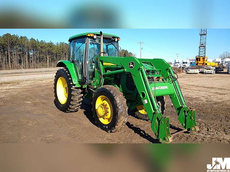 JOHN DEERE 6715 4X4 TRACTOR W/ LOADER Jeff Martin Auctioneers, Inc.