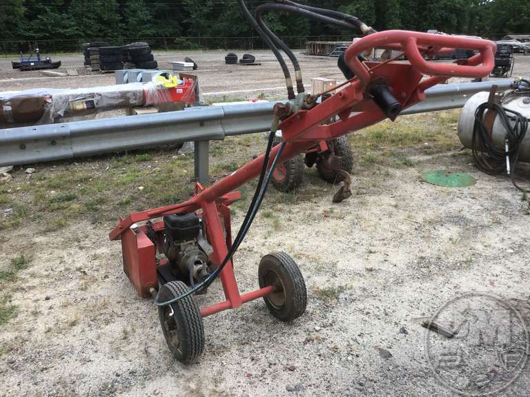 PULL BEHIND AUGER, GAS B&S ENGINE, HYDRAULIC TANK Jeff Martin Auctioneers, Inc.