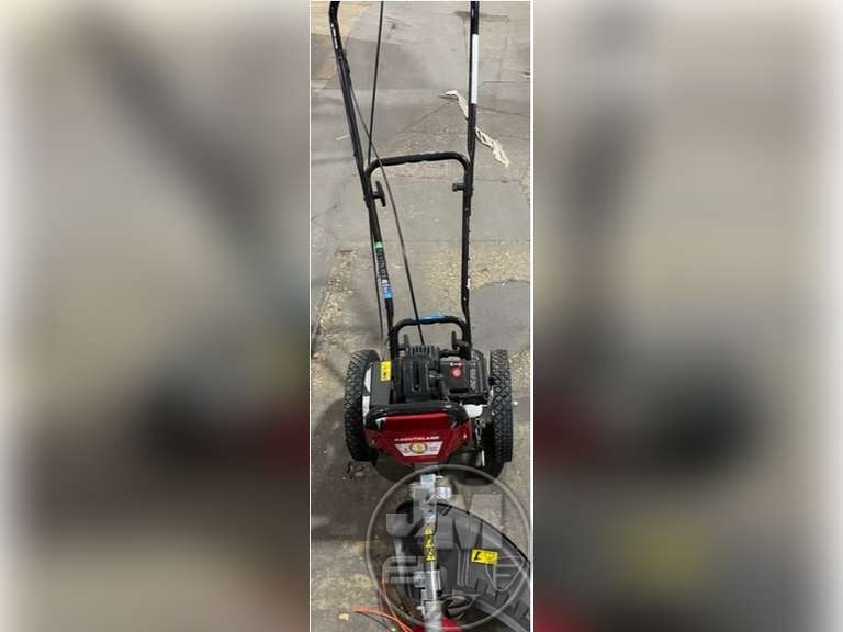SOUTHLAND STRING TRIMMER ON WHEELS - Jeff Martin Auctioneers, Inc.