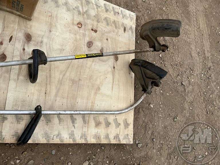 (2) JOHN DEERE STRING TRIMMERS Jeff Martin Auctioneers, Inc.