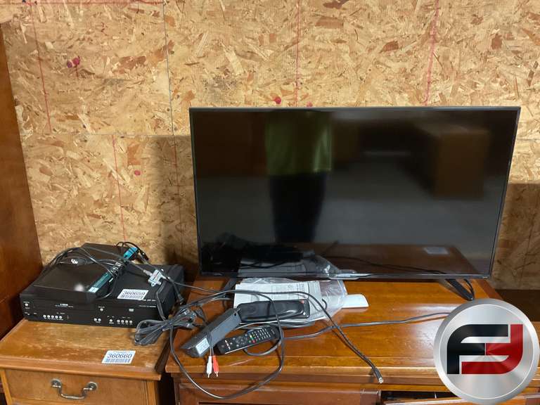 MAGNAVOX DVD VHS PLAYER AND HISENSE TV Freije & Freije Auctioneers