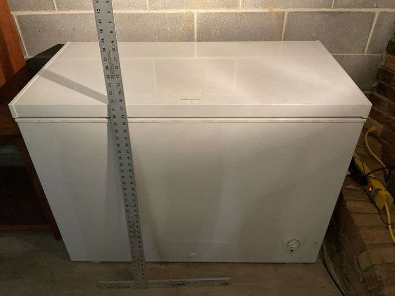 Frigidaire chest freezer. Without contents Legacy Auction Company