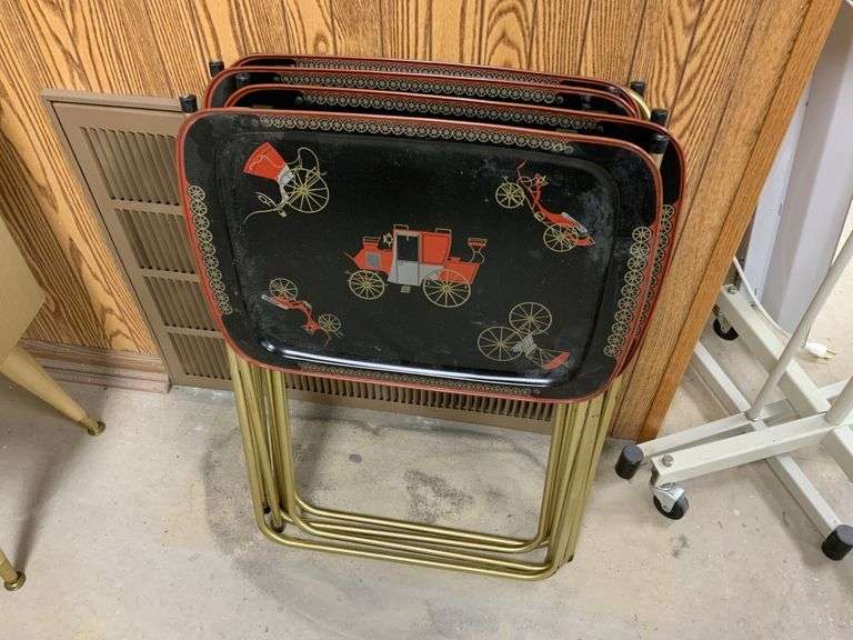 Four TV trays Legacy Auction Company