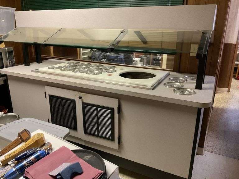 Refrigerated salad bar on wheels, works good. 92 Legacy Auction Company