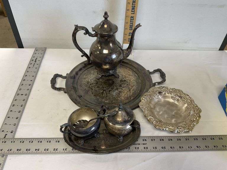Silver serving pieces Legacy Auction Company