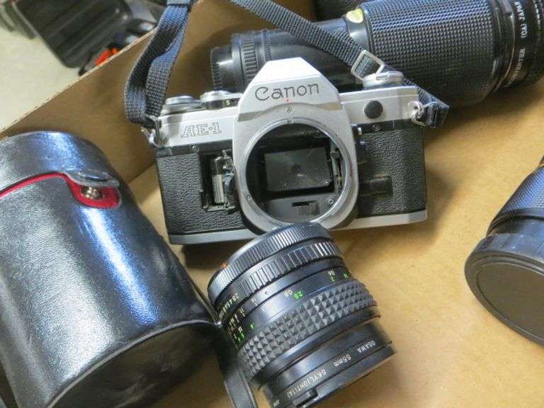 Canon AE1 with 5 Lenses Lambrecht Auction, Inc.
