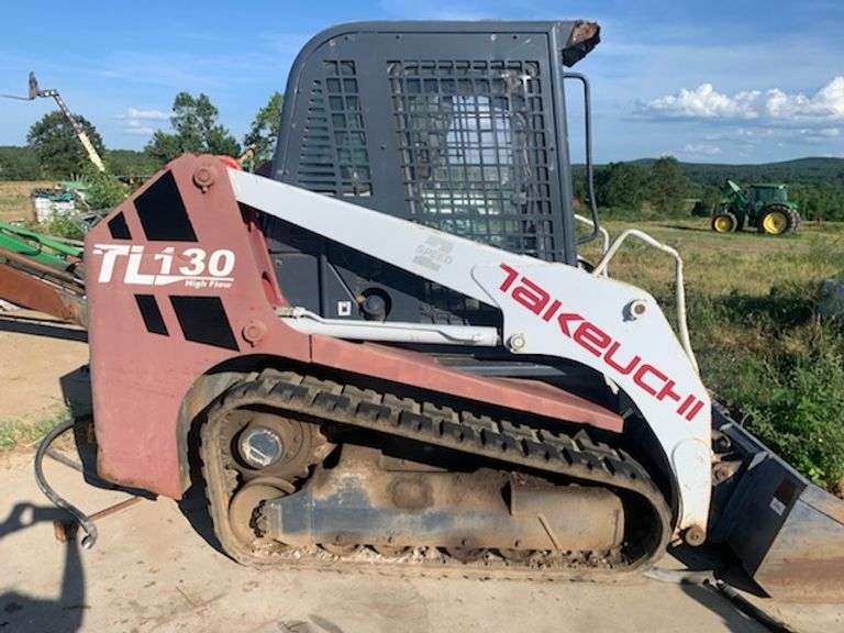 TL130 Takeuchi SKidsteer - Leap Auctions, LLC