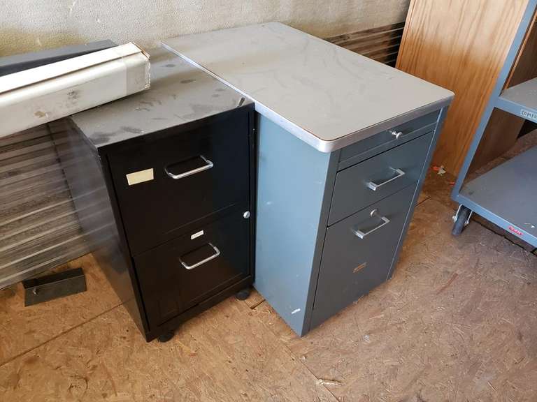 2 metal filing Adam Marshall Land & Auction, LLC