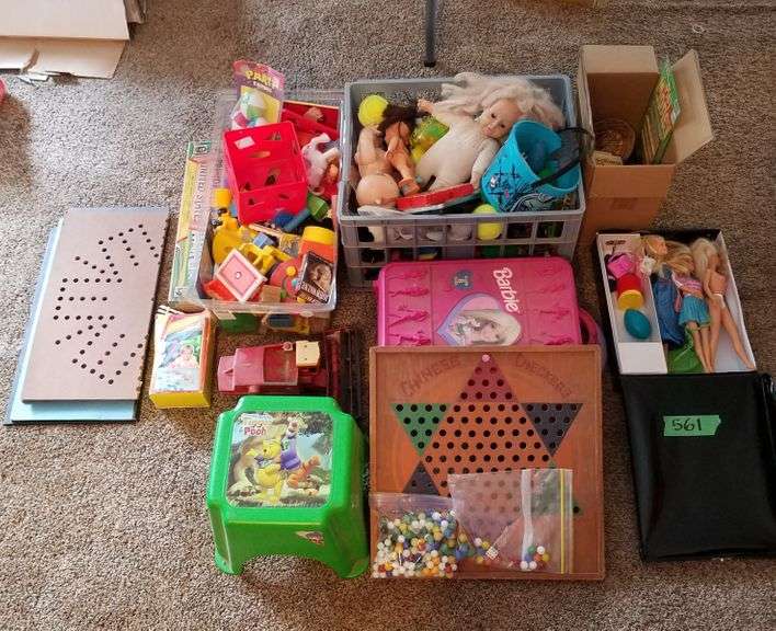 Assorted children's toys Adam Marshall Land & Auction, LLC