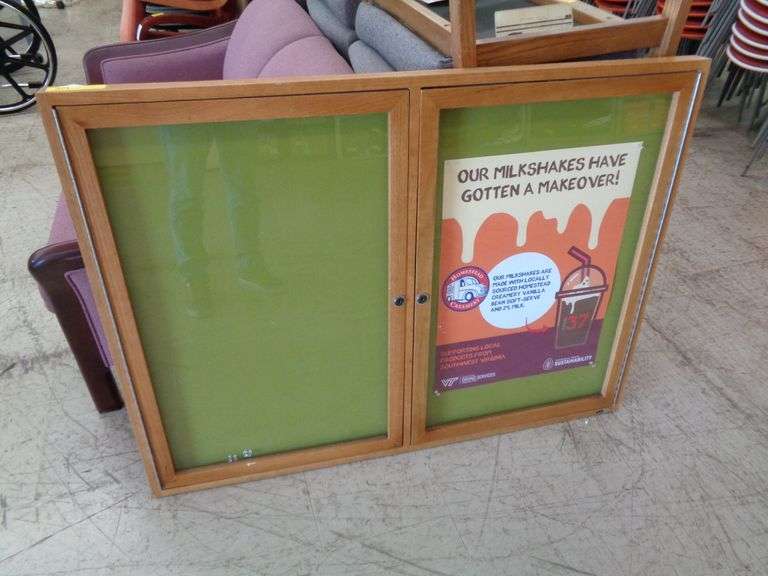 1 WALL MOUNTED DISPLAY BOARD Matthews Auctioneers