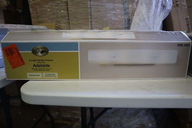 Hampton Bay 4 light vanity fixture - Matthews Auctioneers