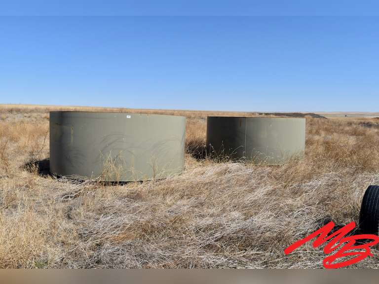 (2) Half Steel Tanks Musser Bros. Inc.