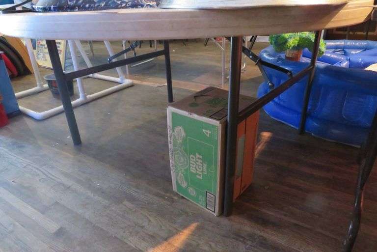 5' PLASTIC FOLDING ROUND TABLE McPherson Auction & Realty