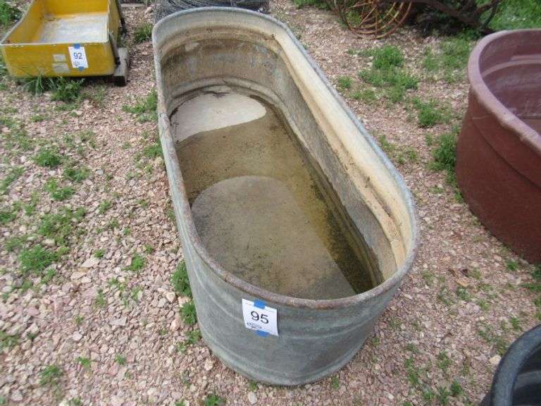 GALVANIZED WATER TANK REPAIRED McPherson Auction & Realty