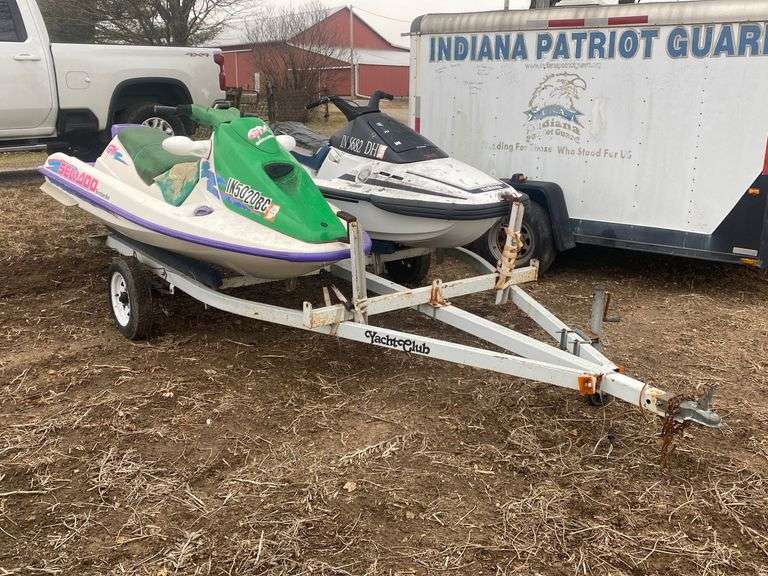 Seadoo & Yamaha jet skis with trailer. Trailer and jet skis have titles, 25 title