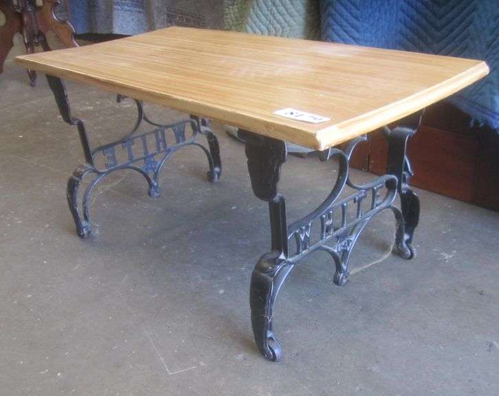 Coffee table made with antique sewing machine legs Mark Van Hook