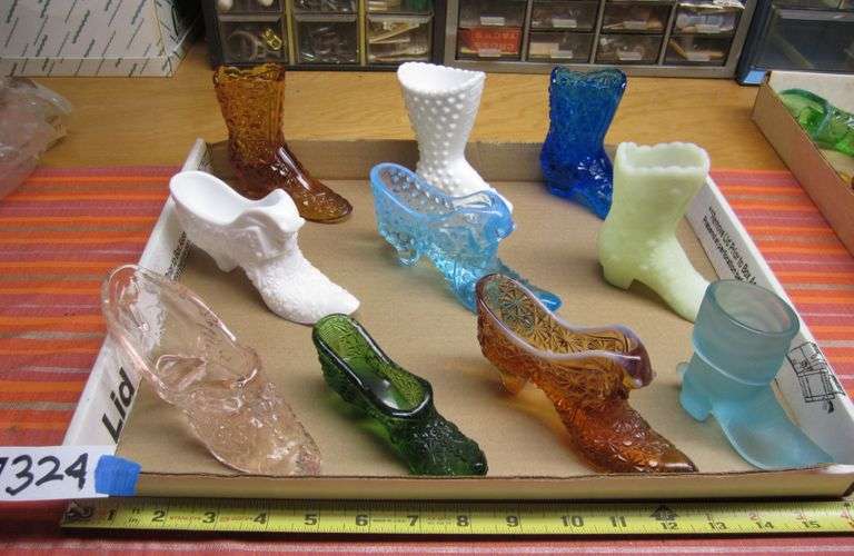 10 glass shoes and boots, mostly Fenton Mark Van Hook, Auctioneer