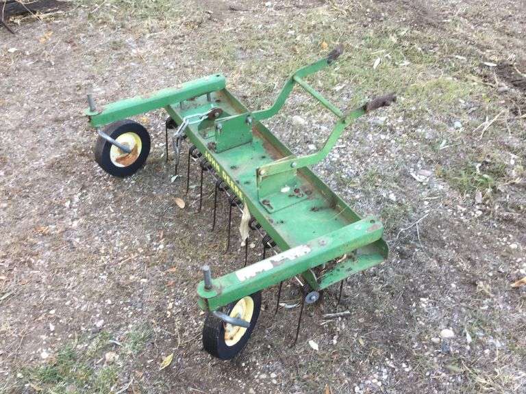 John Deere front mount dethatcher - Peterson Land & Auction LLC