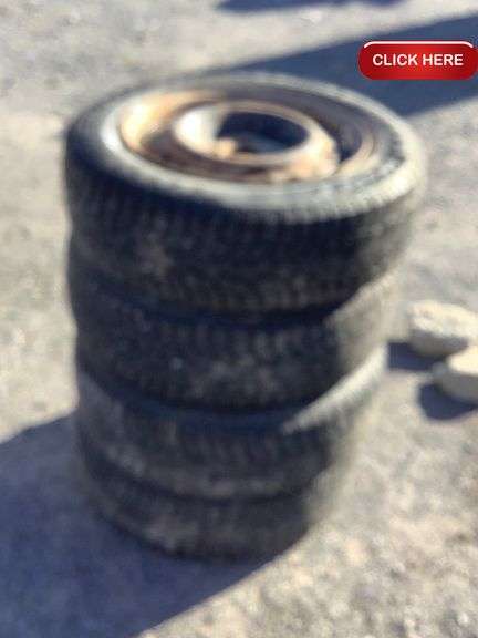 4- 185/65/15 tires on rims - Rideau Auctions