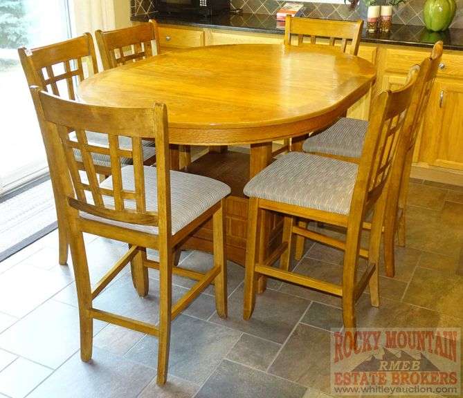 Wonderful Oak HighTop Dining Set W/ Table, 6 Chairs & 1 Leaf. Rocky Mountain Estate Brokers Inc.
