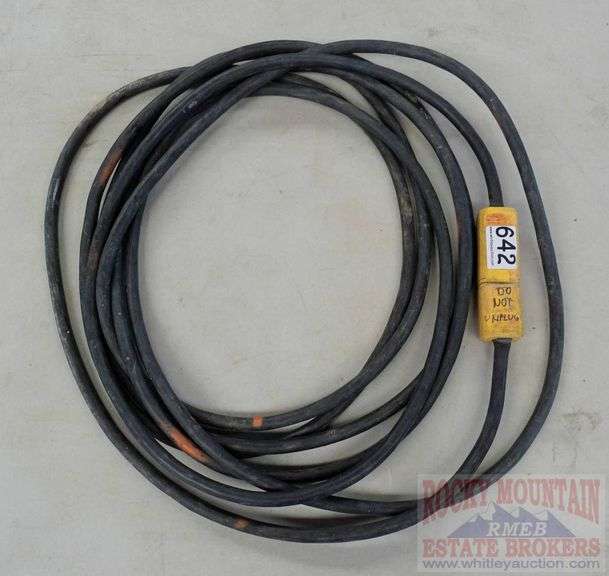Heavy duty 25' black extension cord. Rocky Mountain Estate Brokers Inc.