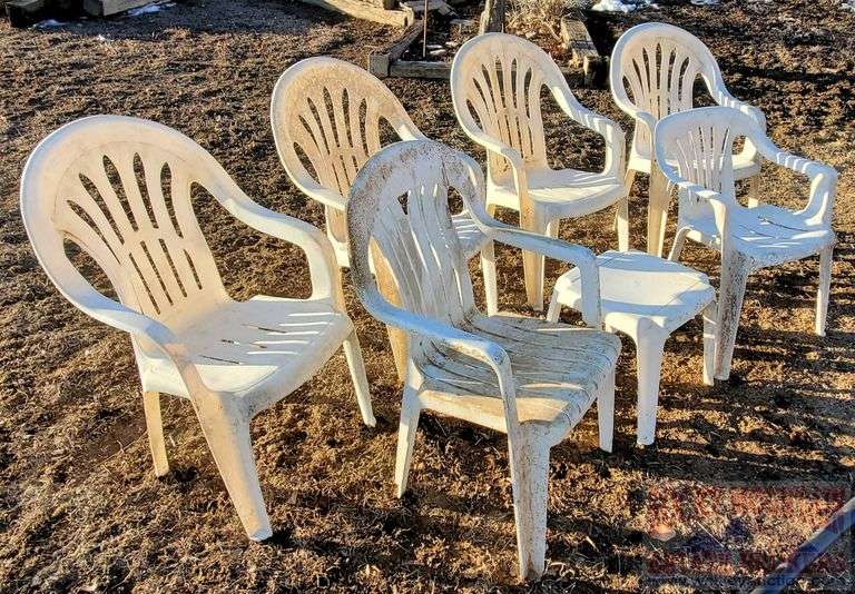 6 white plastic patio chairs & 2 side tables. All for one money