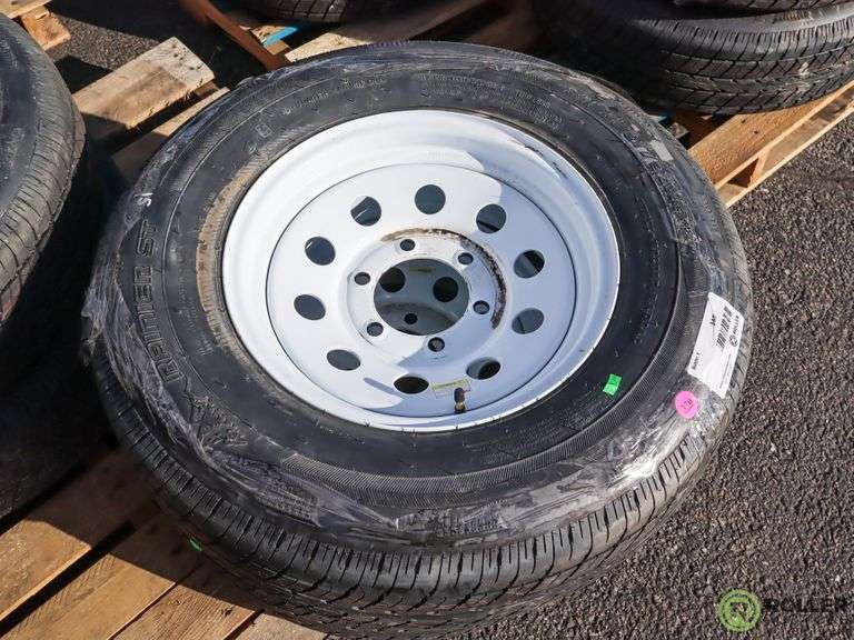 (4) New Rainier ST 225/75R15 Tires with Wheels Roller Auctions