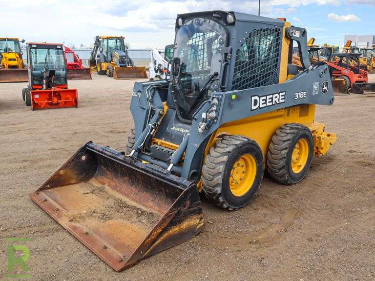 2014 John Deere 318E Skid Steer Loader Roller Auctions