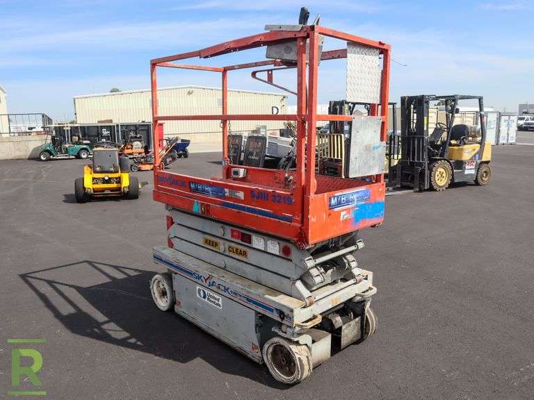 SkyJack 3219 Electric Scissor Lift, 64" x 24" Deck, 36" Extension, 19