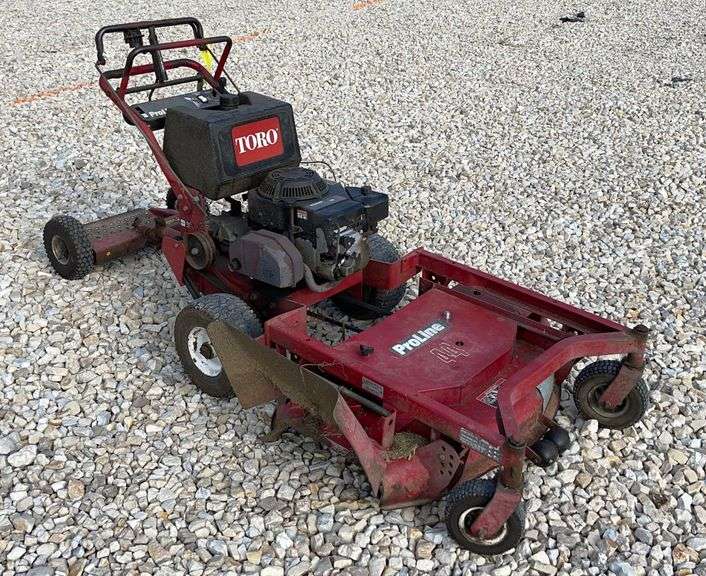Toro Proline 44 walk behind mower Schneider Auctioneers LLC