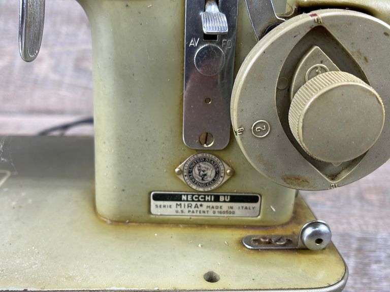 Vintage Necchi sewing machine Schneider Auctioneers LLC