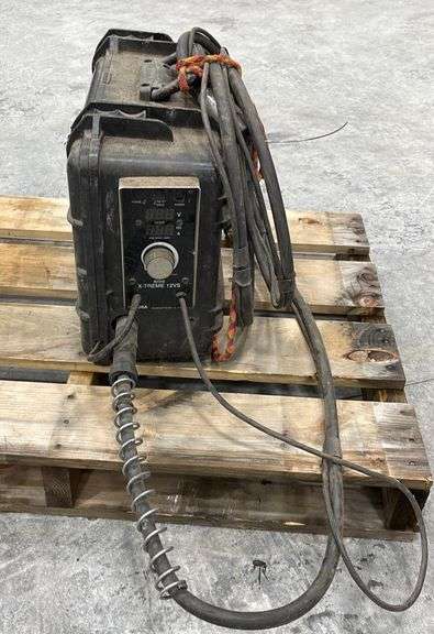Miller Suitcase X-Treme 12VS mig welder - Schneider Auctioneers LLC