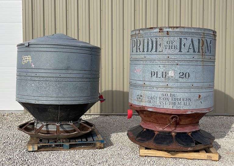 2 older galvanized hog feeders Schneider Auctioneers LLC
