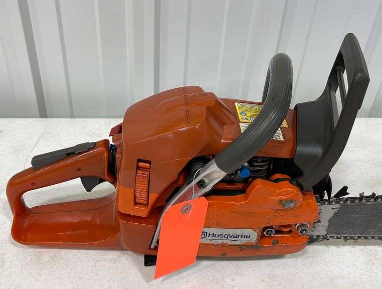 Husqvarna 359 chainsaw - Schneider Auctioneers LLC
