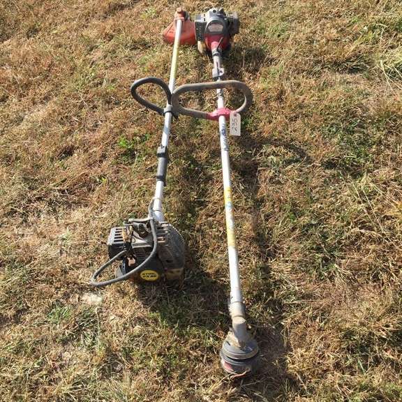 Kawasaki and Stihl weed eater - Wolfe Auction & Realty, LLC