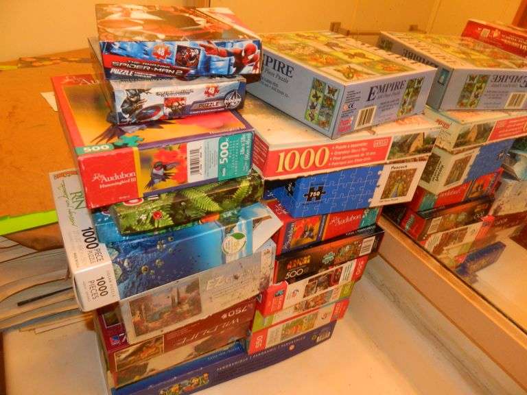 Puzzles in Boxes Wolfe Auction & Realty, LLC