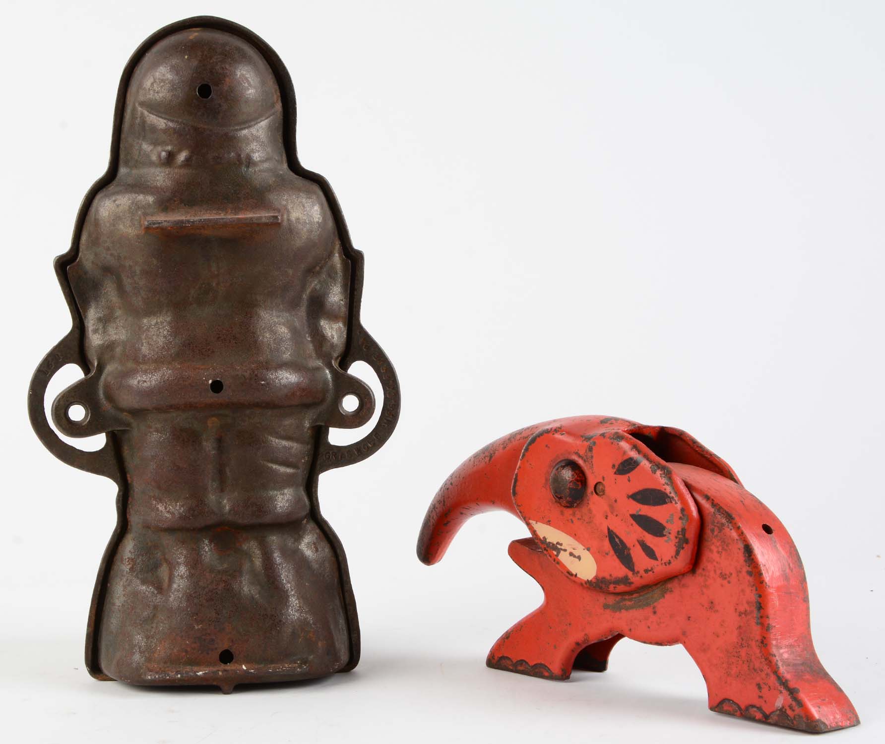 Lot Detail LOT OF 2 CAST IRON SANTA MOLD & NUT CRACKER.