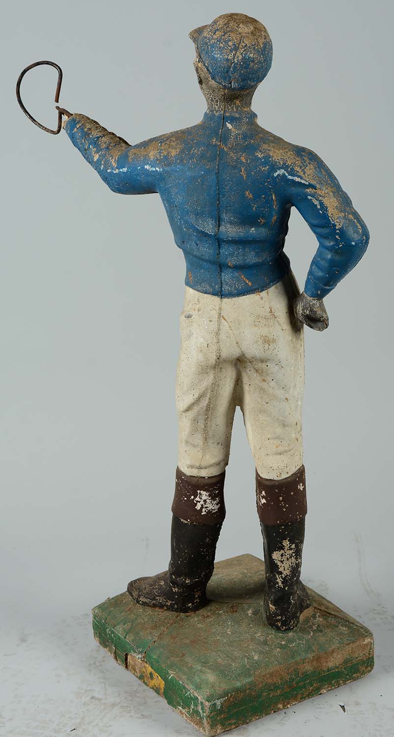 Lot Detail CONCRETE LAWN JOCKEY.