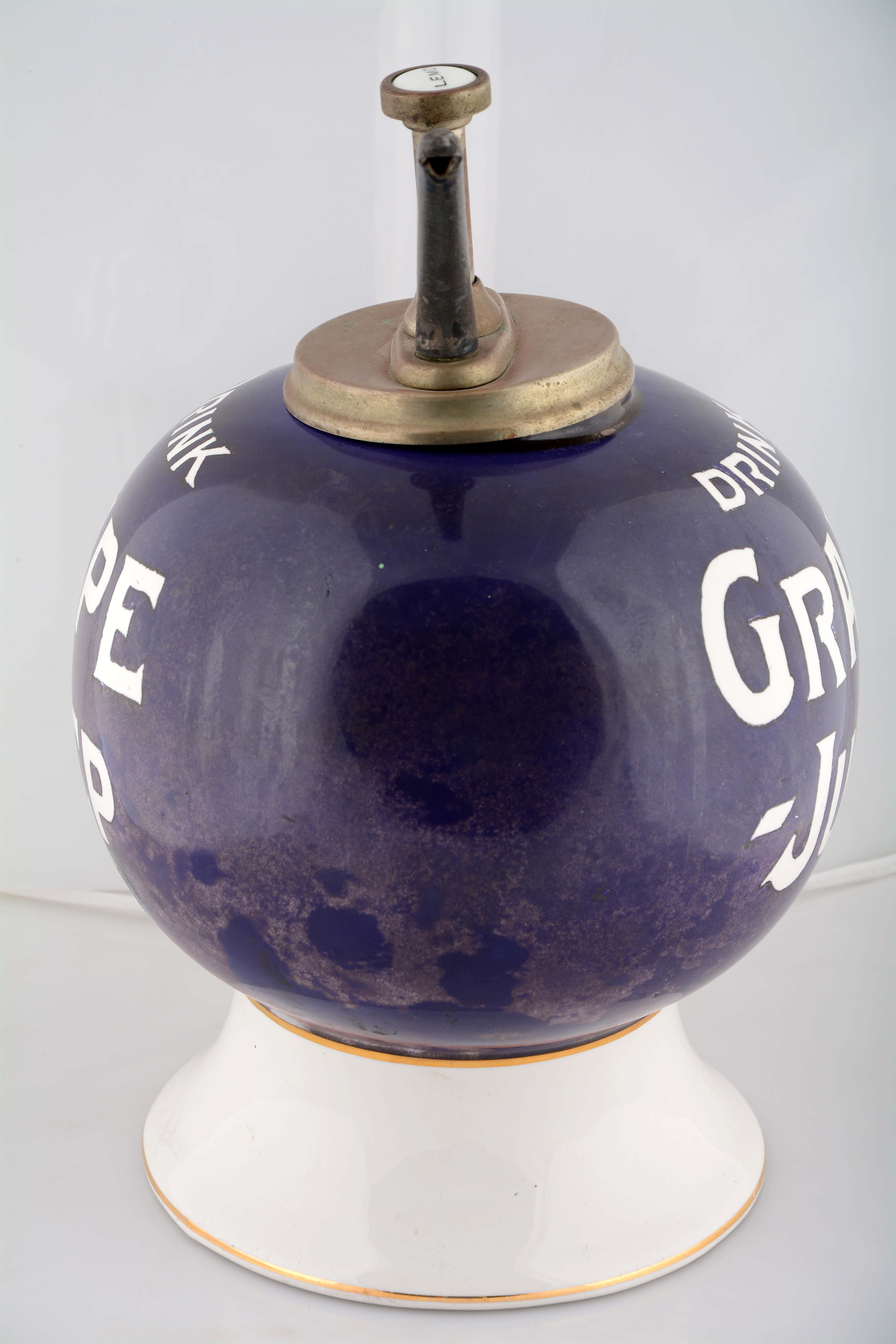 Lot Detail GRAPE JULEP SYRUP DISPENSER WITH OLD PUMP.