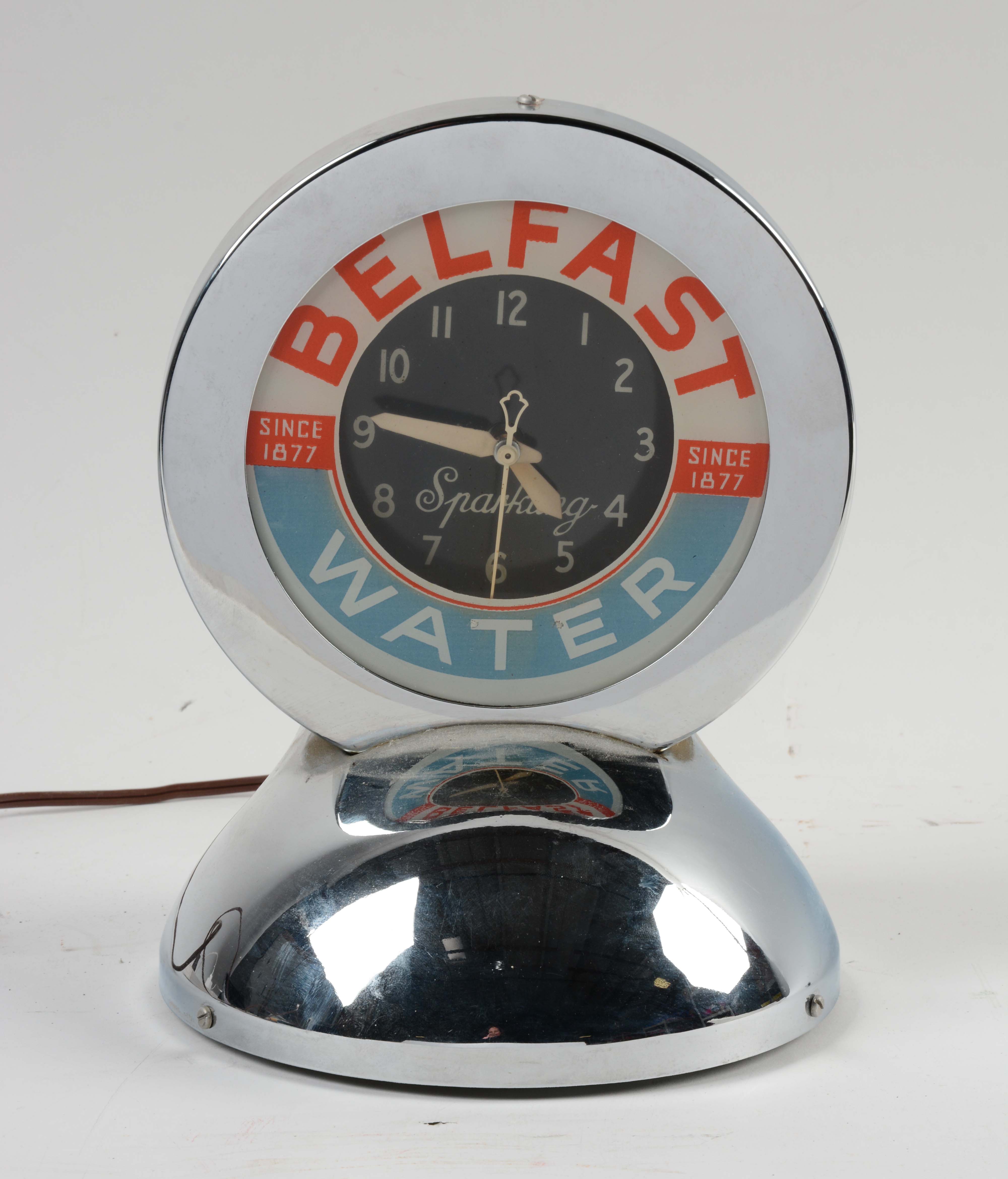 Lot Detail BELFAST SPARKLING WATER REVERSE ON GLASS DESK TOP GLO DIAL