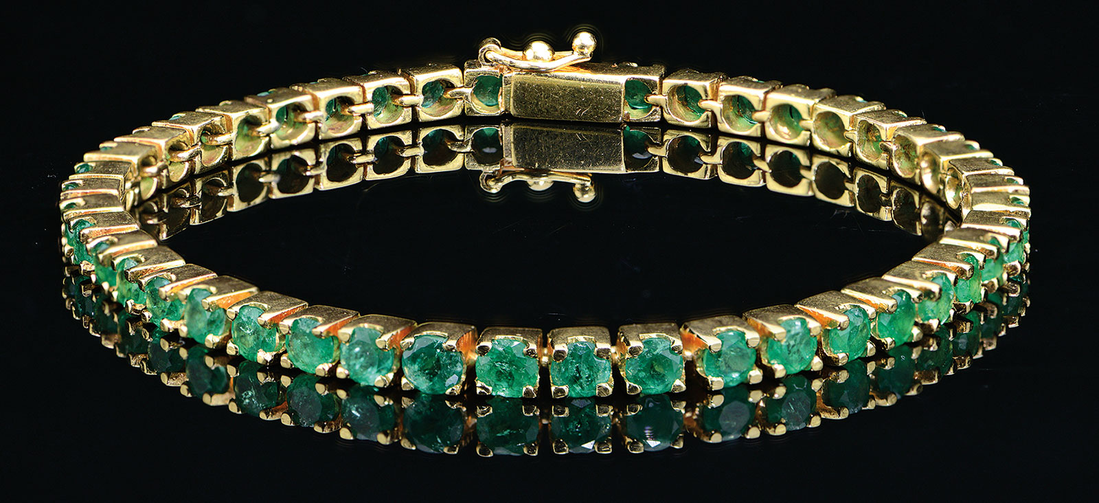 Lot Detail 18KT YELLOW GOLD & EMERALD BRACELET.