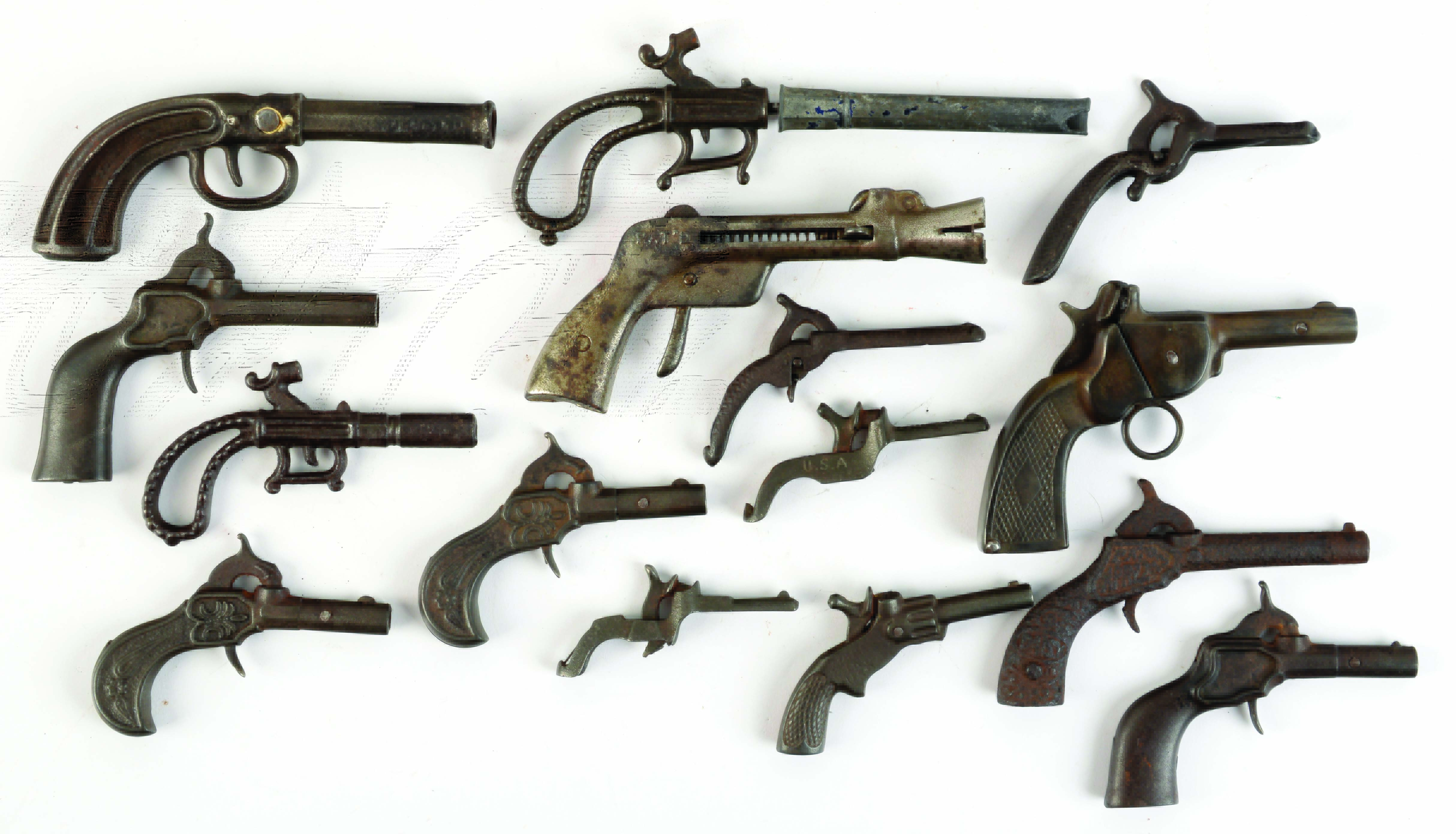 Lot Detail LOT OF 15 VINTAGE EARLY CASTIRON CAP GUNS.