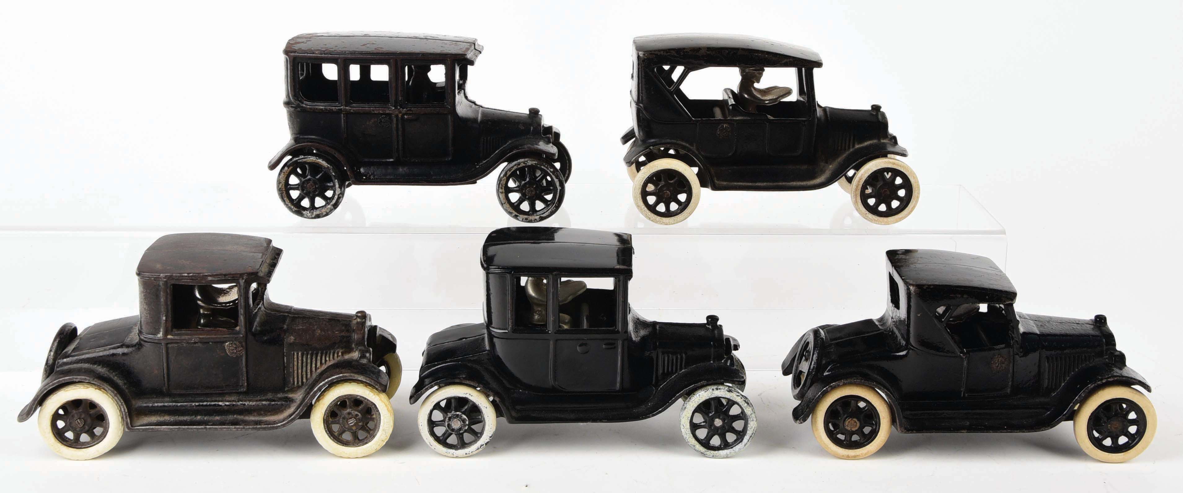 Lot Detail LOT OF 5 CASTIRON ARCADE CHEVY AND FORD AUTOMOBILE TOYS.