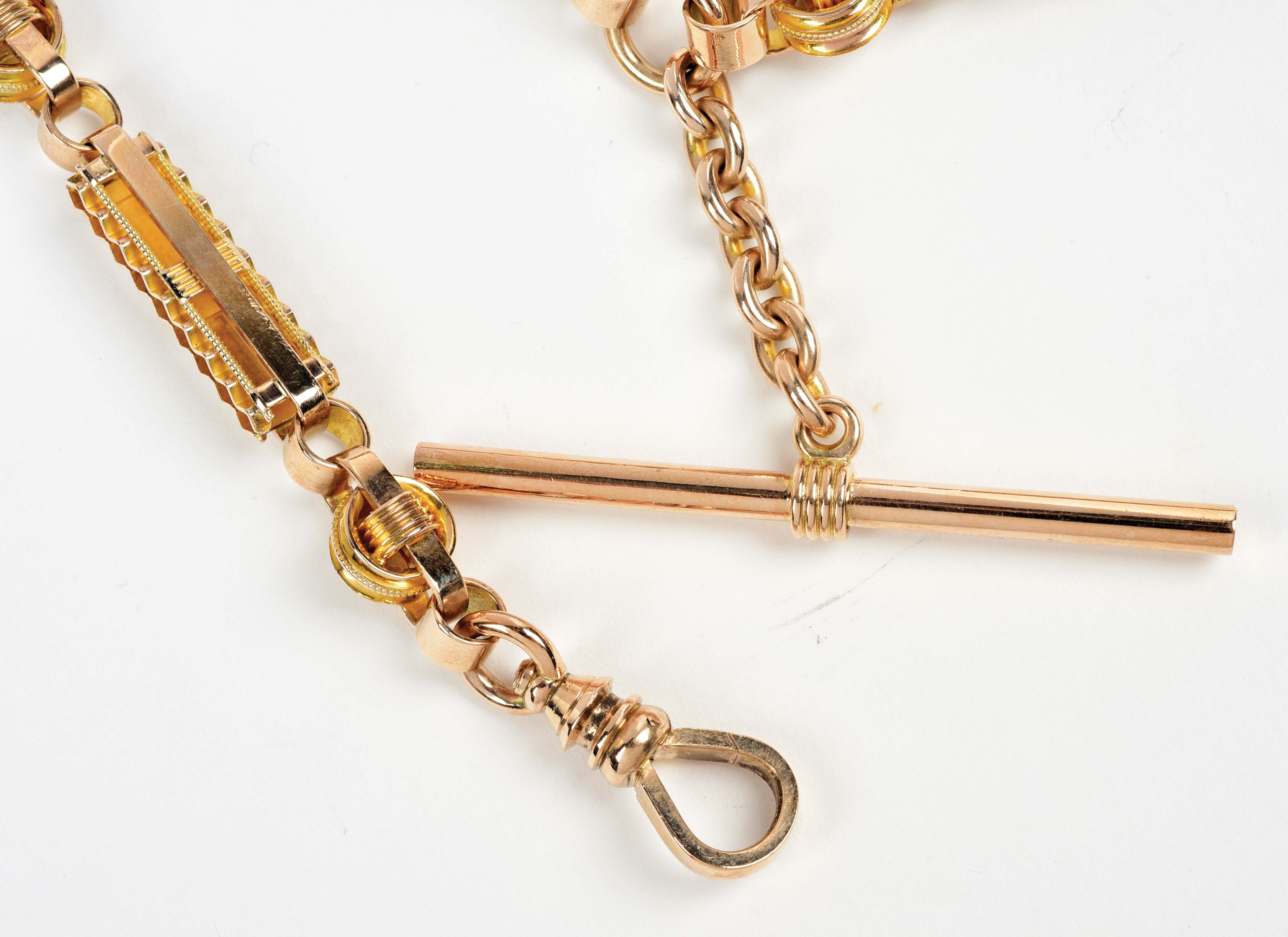 Lot Detail 10K YELLOW GOLD POCKET WATCH CHAIN WITH FANCY LINKS AND FOB.